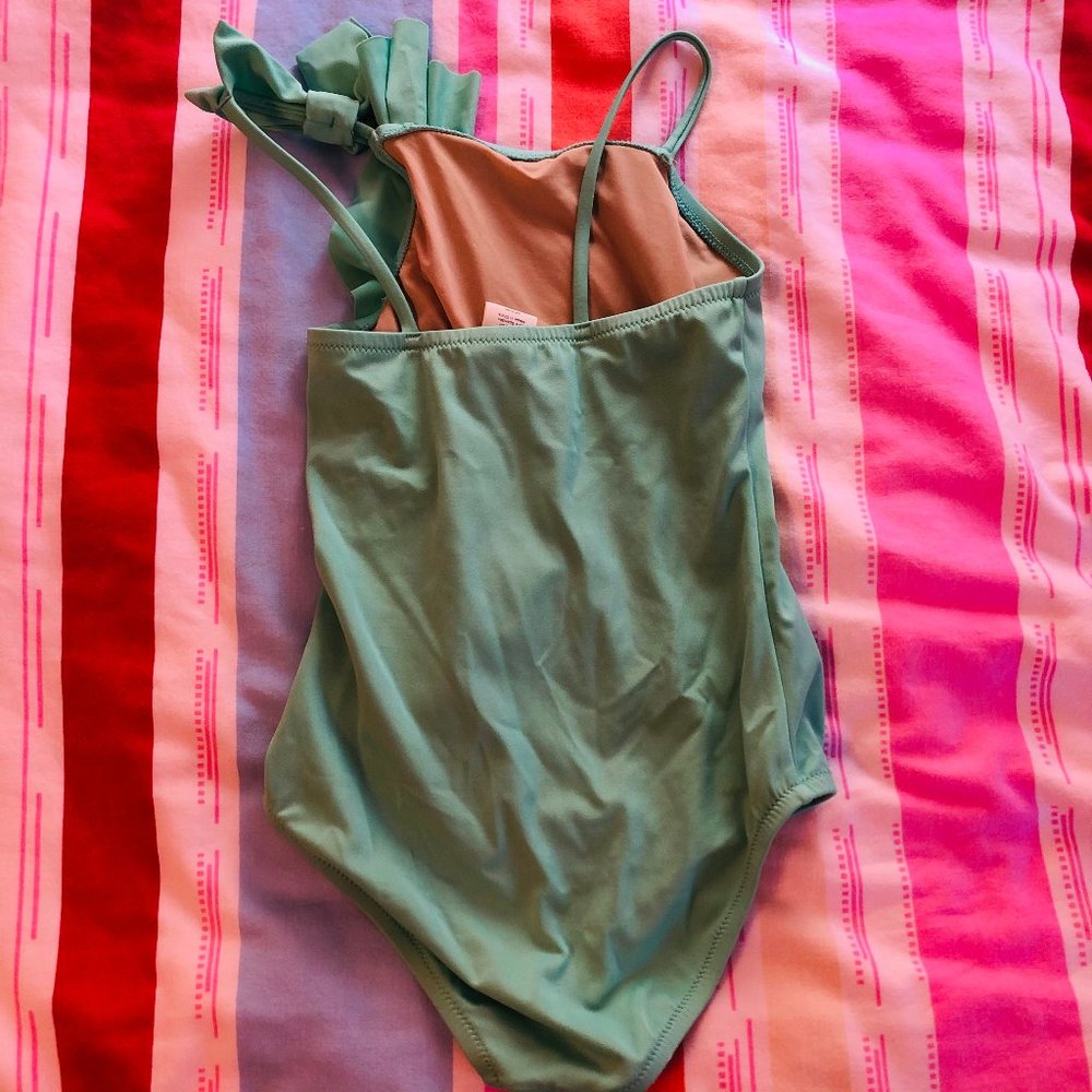 Girl’s Size 8 Mint Green Colored One Piece swim